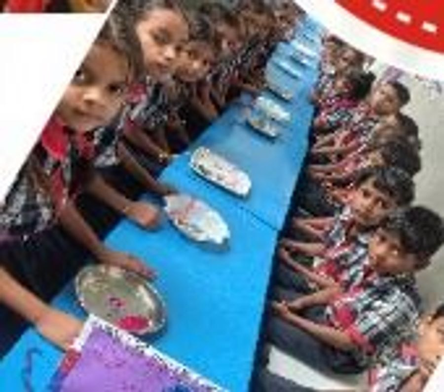 Students taking part in a music activity with handmade instruments