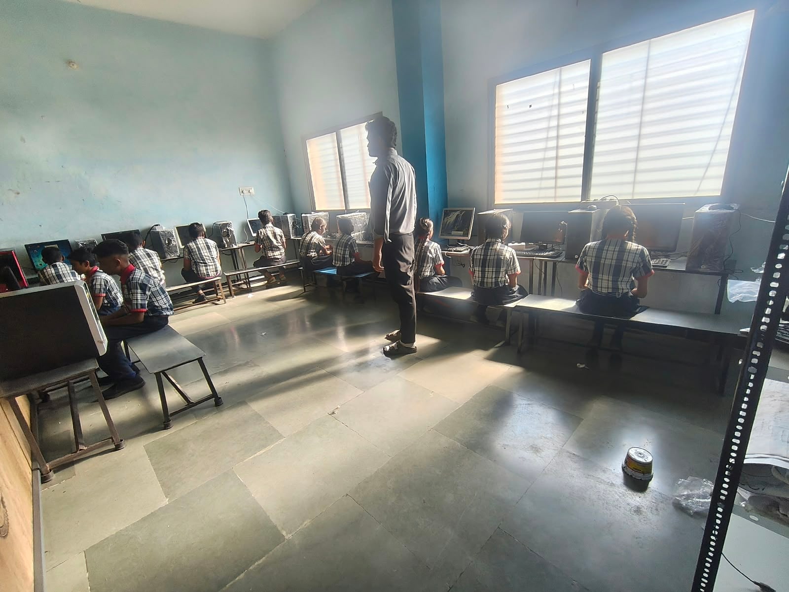 Pupils working at computer stations in the computer class at Sunrise Convent School, Bhensola